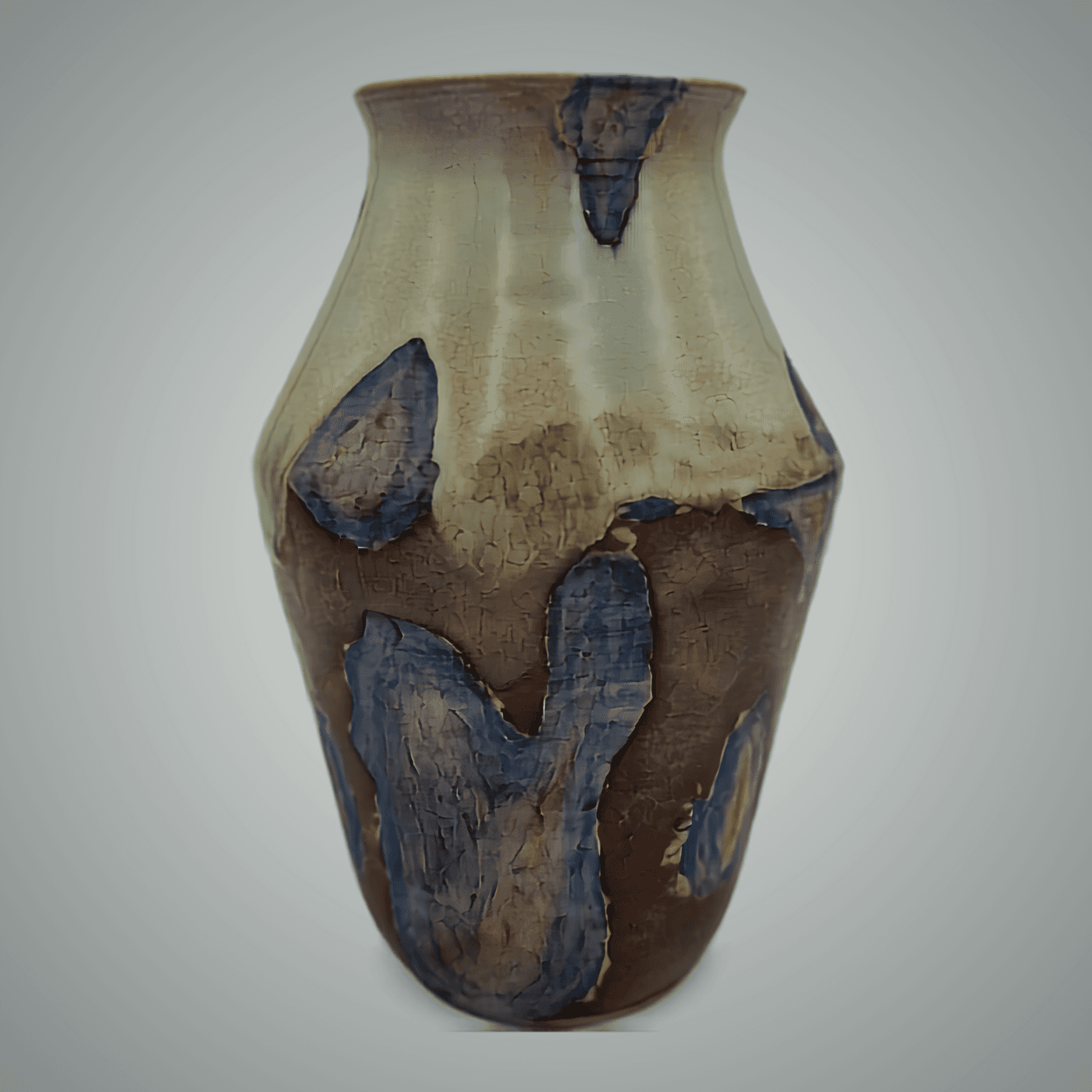 Wheel-thrown stoneware vase with layered mineral glazes - blue, cream and rust tones interacting during firing. One of a kind by ceramist Przemysław Gołębiewski, Berlin.